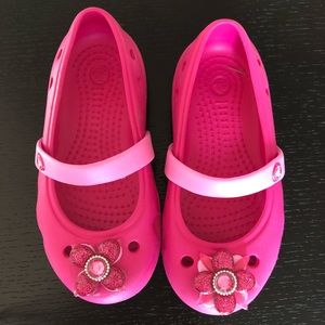 Pink Crocs sandals
